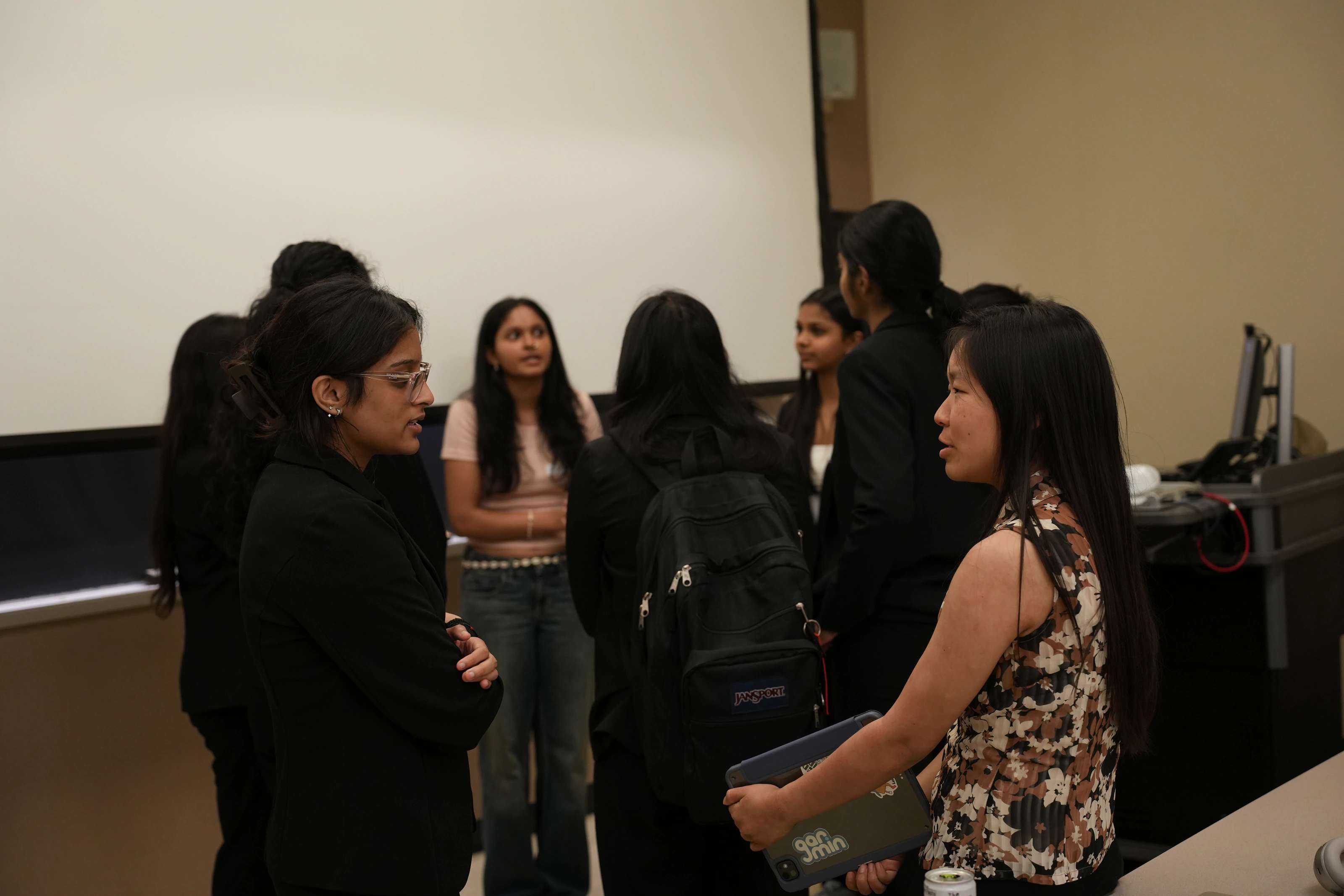 KTP members talking with students during a professional event